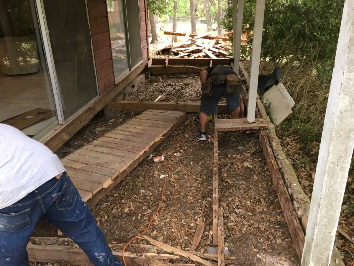 Demolition of the old porch floor in progress