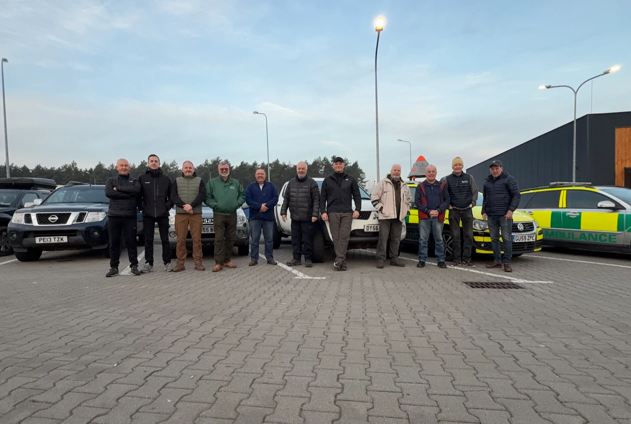 On this particular mission, at some point my American buddy, JC, affectionately coined the term "Preston's Eleven" referring to the drivers. That's Preston in the middle, undisputably in charge of his crew.