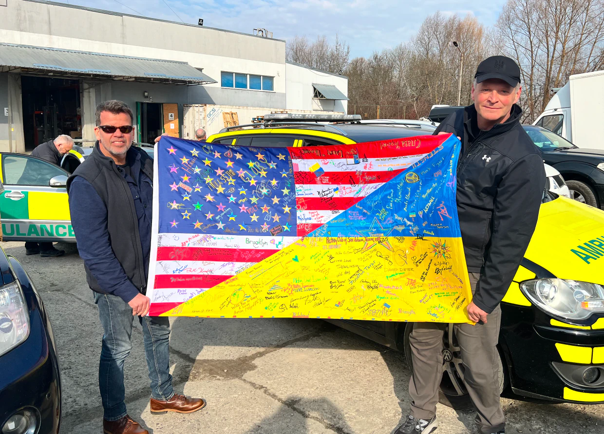 In addition to cars, JC and I brought with us a Ukraine-American friendship flag signed by many of the members of our Rotary Club in San Antonio